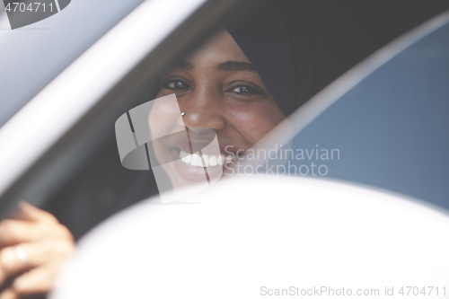 Image of Arabic Woman Traveling By Car
