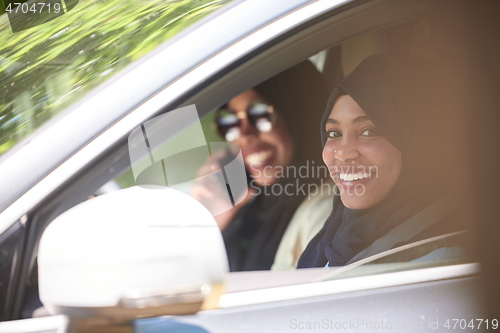 Image of Arabic Woman Couple Traveling By Car