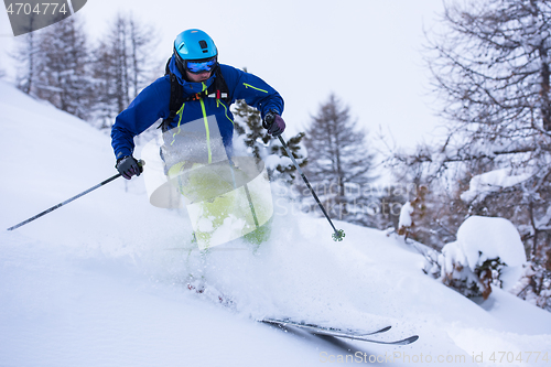 Image of freeride skier skiing downhill