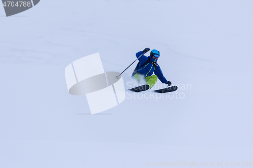 Image of freeride skier skiing downhill