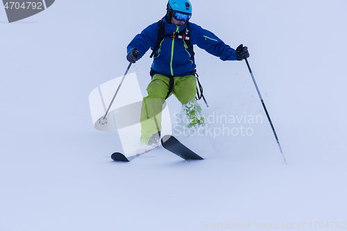 Image of freeride skier skiing downhill