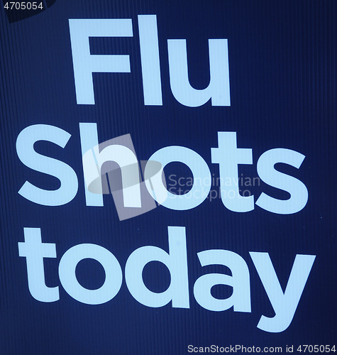 Image of Flu shots today sign.