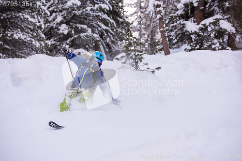 Image of freeride skier skiing downhill