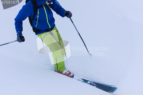 Image of freeride skier skiing downhill