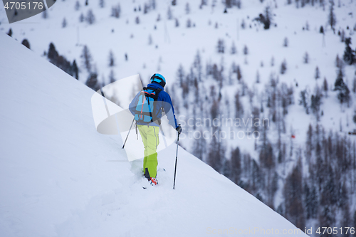 Image of freeride skier skiing downhill