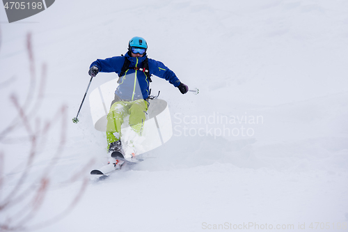 Image of freeride skier skiing downhill