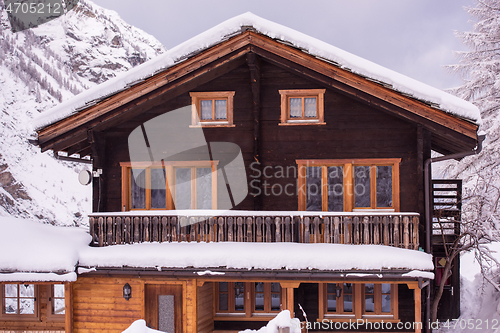 Image of mountain houses at cold winter day