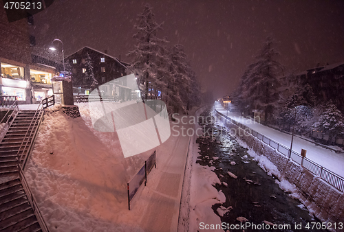 Image of snowy streets of the Alpine mountain village