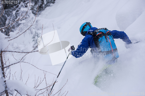 Image of freeride skier skiing downhill