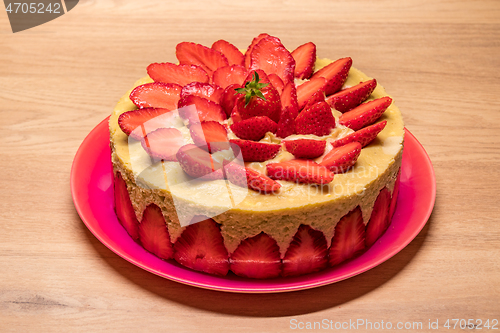 Image of homemade strawberry cake in a red dish