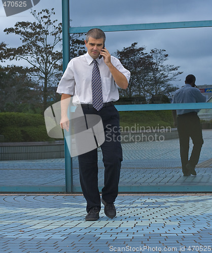 Image of Businessman calling