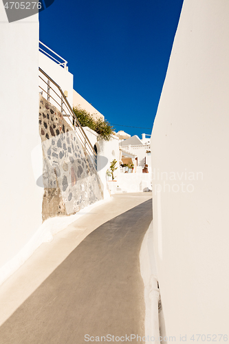 Image of typical little street in santorini in greece in cyclades