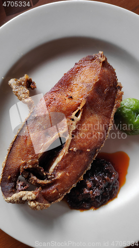 Image of Fried fish fillet in a plate