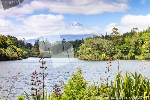 Image of volcano Taranaki covered in clouds, New Zealand 