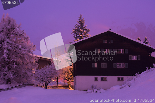 Image of mountain houses in a cold winter night