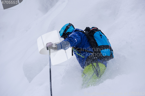 Image of freeride skier skiing downhill