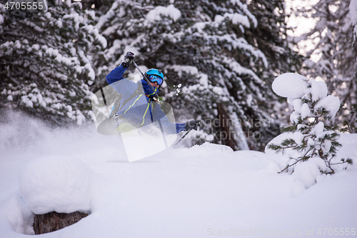 Image of freeride skier skiing downhill