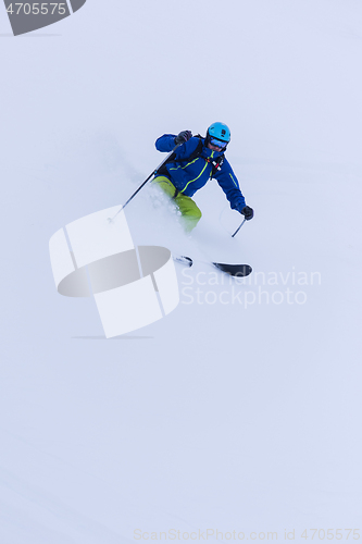 Image of freeride skier skiing downhill