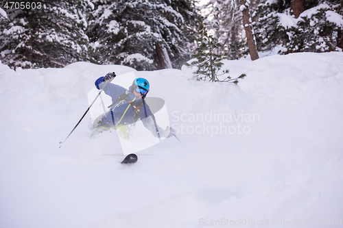 Image of freeride skier skiing downhill