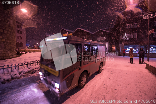 Image of Electric taxi bus in the car-free holiday montain resort