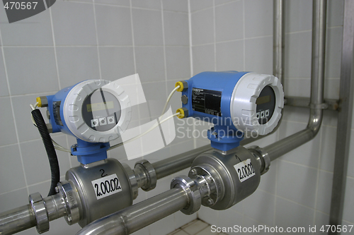 Image of temperature control valves in dairy production factory