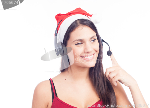 Image of Christmas headset woman from telemarketing call center wearing red santa hat talking smiling isolated on white background.