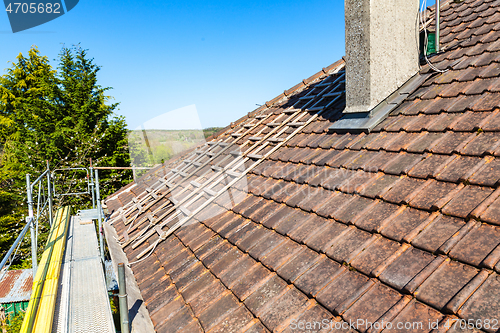 Image of renovation of a brick tiled roof