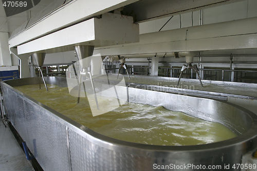 Image of cheese making machine in modern dairy