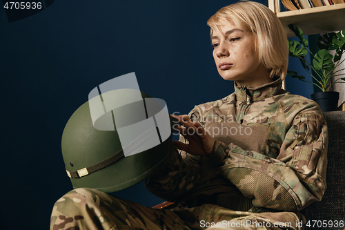 Image of Portrait of young female soldier