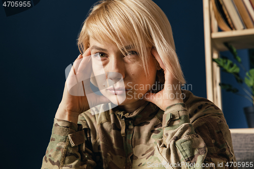 Image of Portrait of young female soldier