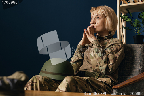 Image of Portrait of young female soldier