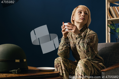 Image of Portrait of young female soldier