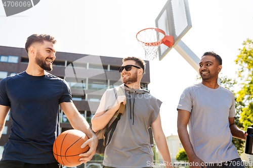 Image of group of male friends going to play basketball