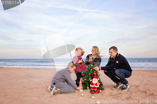 Image of Final touches for Christmas party on the beach