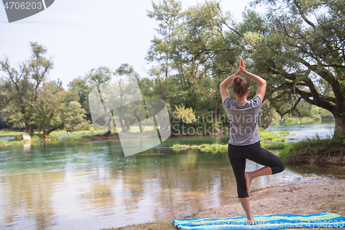 Image of woman meditating and doing yoga exercise