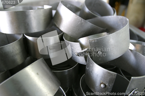 Image of cheese moulds in modern dairy factory