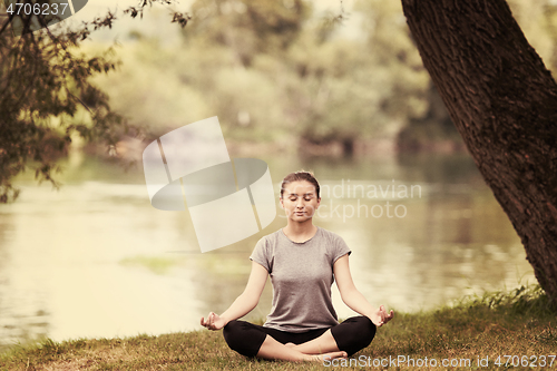 Image of woman meditating and doing yoga exercise