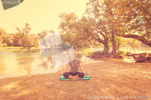 Image of woman meditating and doing yoga exercise