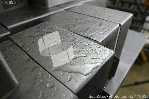 Image of cheese moulds in modern dairy factory