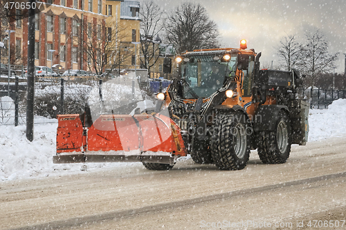 Image of Tractor and Articulated Snow Plough in City