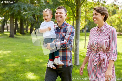 Image of happy family at summer park