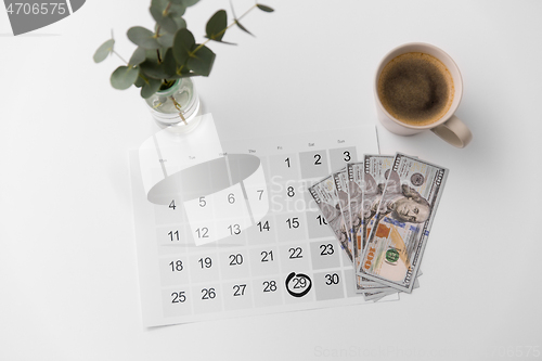 Image of black friday date on calendar, money and coffee