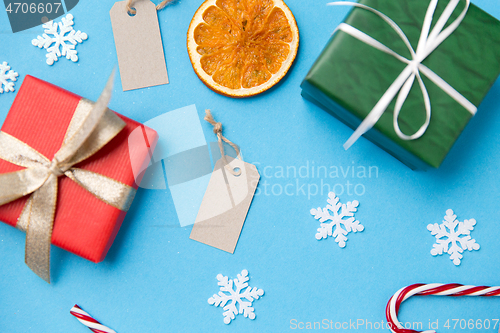 Image of christmas gifts, tags and decorations