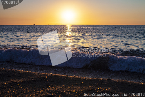 Image of Red sunset over the sea. Beautiful sunset.