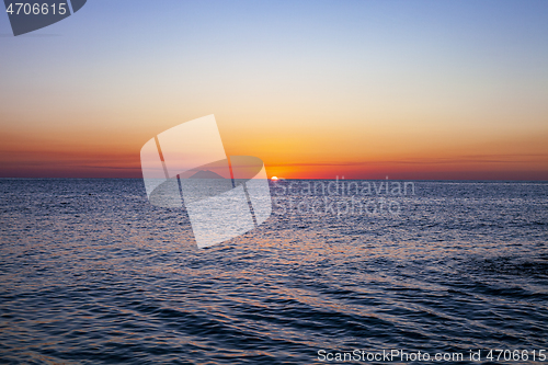 Image of Red sunset over the sea. Beautiful sunset.