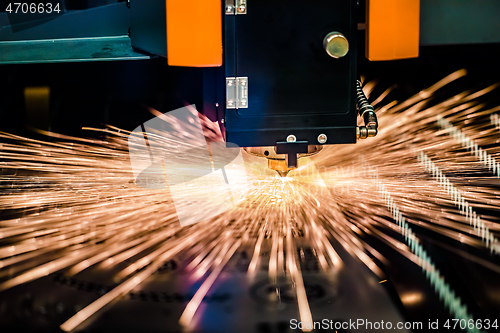 Image of CNC Laser cutting of metal, modern industrial technology.