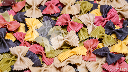 Image of Colored Farfalle Pasta bow tie pasta background.