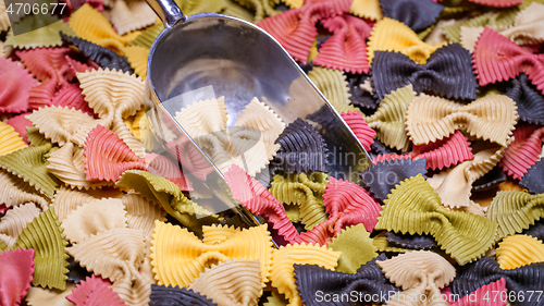 Image of Colored Farfalle Pasta bow tie pasta background.