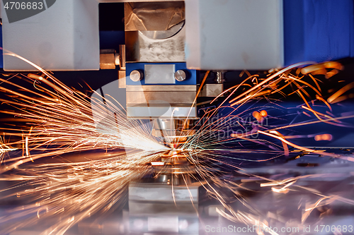 Image of CNC Laser cutting of metal, modern industrial technology.