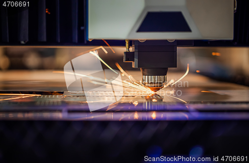 Image of CNC Laser cutting of metal, modern industrial technology.